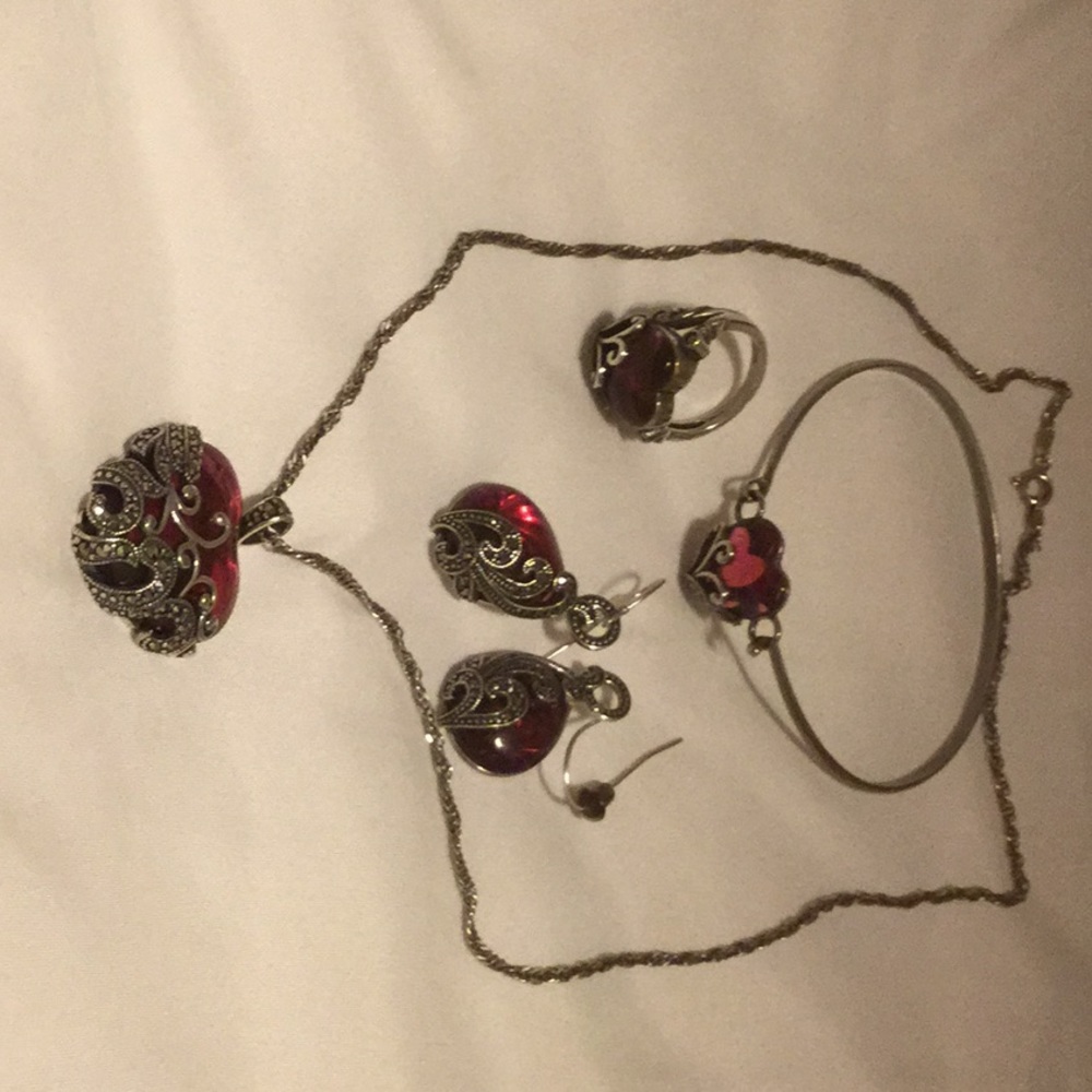 Ring, necklace, bracelet and earrings